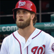 Illustration for article titled Javier Báez Robs Bryce Harper With Perfect Leaping Grab